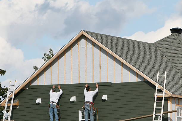 Professional Siding Replacement technician working in Grandy, NC